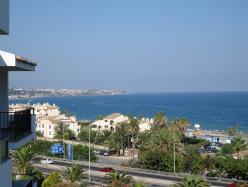 Popular sandy beach and the Mediterranean sea